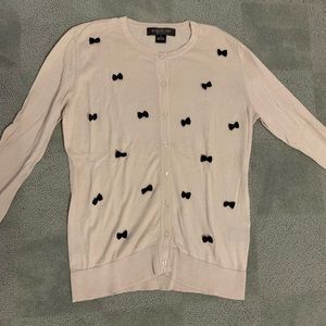 Nude and black bow cardigan